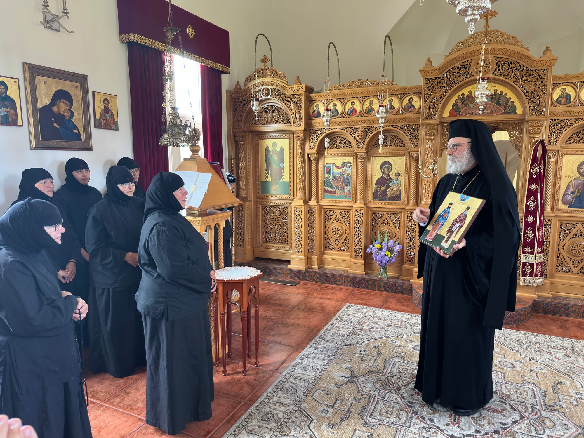 Met. Saba presents the nuns of the Nativity of the Theotokos Greek Orthodox Convent with an icon of Ss. Nicholas and Habib Khasha of Damascus.