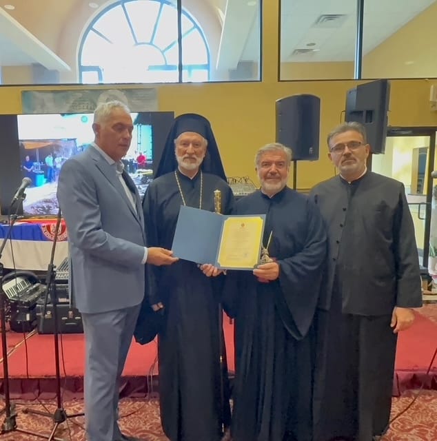Bishop Irinej honored clergy and parishioners of the parish with awards. Photo: Savo Majstorovic