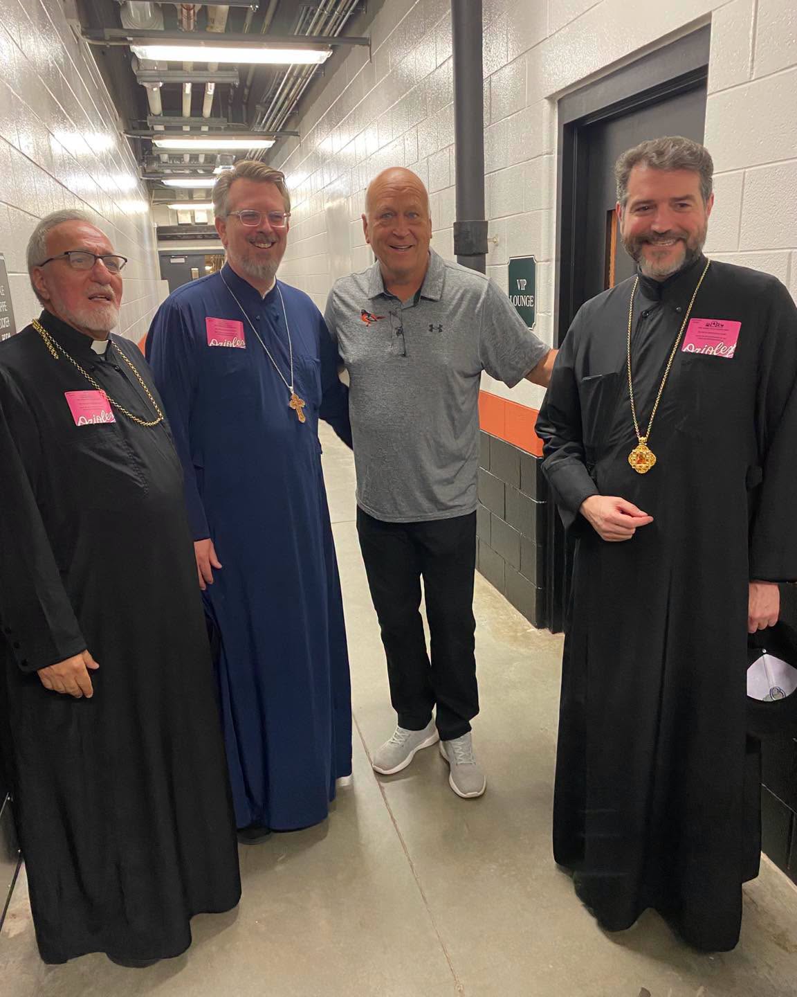 Metr. Apostolos and clergy of the Greek Orthodox Metropolis of New Jersey meet MLB legend Cal Ripken, Jr., who holds the "Iron Man" streak record of 2,632 consecutive games played. Photo: Greek Orthodox Metropolis of New Jersey/Facebook