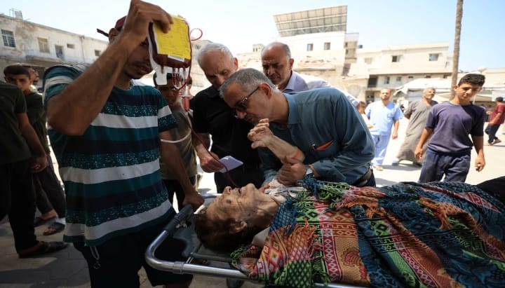 A wounded Palestinian Christian woman is brought into Al-Ahli Arab Hospital following an Israeli strike on The Church of the Holy Family, according to medics, in Gaza City July 17, 2025. Photo: REUTERS/Dawoud Abu Alka