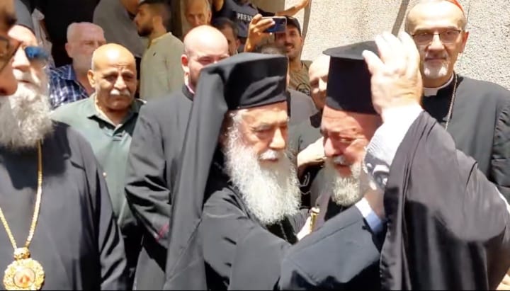 His Eminence Archbishop Alexios of Tiberias greets Patriarch Theophilos with tears. Source: St. Porphyrios Orthodox Church