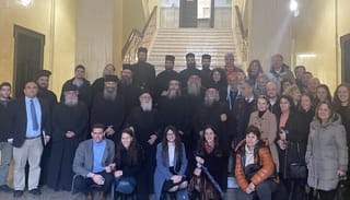 Presbyter Anastasios with clergy and believers who came to support him in the courtroom. Photo: eeod.gr