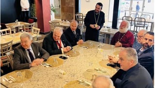 Michael Karloutsos in bottom right corner. Photo: thenationalherald.com