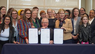 Gov. Tim Walz signs bills into law in 2023 intending to make Minnesota an abortion and LGBTQ+ refuge. Photo: Office of Governor Tim Walz & Lt. Governor Peggy Flanagan