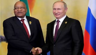 Former South African President Jacob Zuma and Russian President Vladimir Putin. Photo: Mikhail Klimentyev/AFP/Getty Images