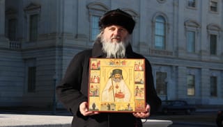 His Grace Bishop Theodosius of Seattle holds an icon of St. John Maximovitch on the steps of the U.S. Capitol Building. Photo: Aaron Hickman/UOJ-USA