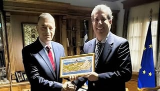 Mount Athos Administrator Alkiviadis Stefanis welcomes Michael Rigas to the Holy Mountain. Photo: Alkiviadis Stefanis/Instagram