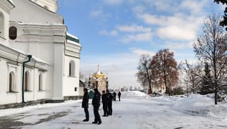 Reserve staff outside the Exaltation of the Cross Church. Photo: Fr Nykyta Chekman/Telegram