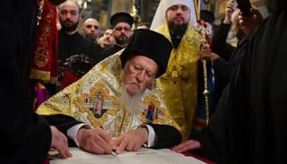 Patriarch Bartholomew signing the Tomos on January 5, 2019. Photo: BBC