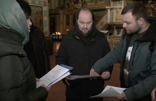 Hierodeacon Pitirim (center) with representatives of the Ministry of Culture. Photo: Screenshot "Suspilne Ternopil"