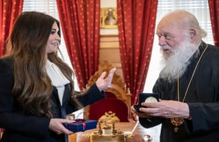 U.S. Ambassador to Greece Kimberly Guilfoyle and Abp. Ieronymos. Photo: AP
