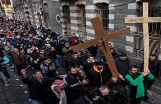 Christians protest in the street in Syria. Photo: Asia News