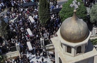 At the funeral of the martyrs of the attack in Damascus, on June 24, 2025. Photo: Ghaith Alsayed/AP