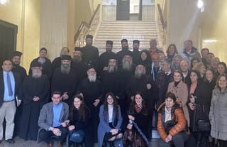 Presbyter Anastasios with clergy and believers who came to support him in the courtroom. Photo: eeod.gr