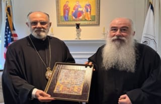 During his visit to the Anticochian Archdiocese of North America headquarters, Archbishop Christophoros presented Metropolitan Saba with an icon of the Resurrection of Christ, brought from