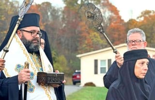 His Grace Bsp. Andrei carries the holy relics of St. Olga of Alaska. Photo: Romanian Orthodox Episcopate of America