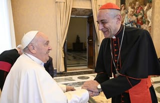 Pope Francis and Cardinal Fernandez. Source: America Magazine