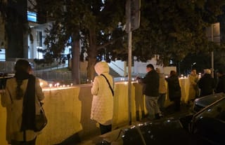 Mourners lit candles outside of Caucasus Medical Center in Tbilisi, where Patr. Ilia II fell asleep in the Lord. Photo: Sota News / X