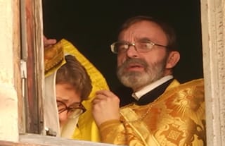 NTA records the Sacrament of Confession through an open window. Photo: NTA/YouTube