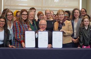 Gov. Tim Walz signs bills into law in 2023 intending to make Minnesota an abortion and LGBTQ+ refuge. Photo: Office of Governor Tim Walz & Lt. Governor Peggy Flanagan