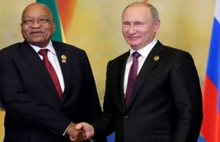 Former South African President Jacob Zuma and Russian President Vladimir Putin. Photo: Mikhail Klimentyev/AFP/Getty Images