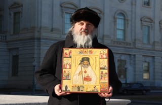 His Grace Bishop Theodosius of Seattle holds an icon of St. John Maximovitch on the steps of the U.S. Capitol Building. Photo: Aaron Hickman/UOJ-USA