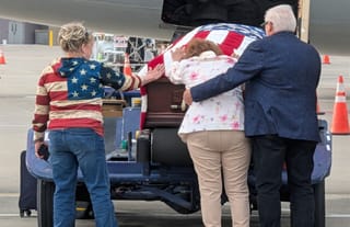 Family welcomes home Army PFC John A. Walko, who was killed in action during the Second World War. Photo: Kevin Gaydosh