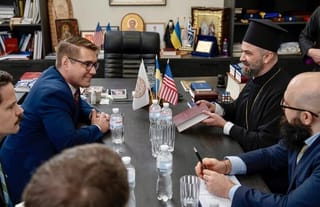 U.S. Assistant Sec. of State for Democracy, Human Rights and Labor Riley Barnes and Exarch of the Ecumenical Patriarchate in Ukraine, Bishop Michael of Koman. Photo: Mission of the