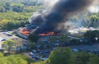 A Mormon church was set ablaze as a gunman entered and killed numerous attendees during a worship service, injuring several more. Photo: mcall.com