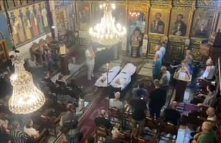 A funeral was held at the St. Porphyrios Church for two Orthodox Christians who were killed in an Israeli strike on the Holy Family Catholic Church. Photo: Khalil Sayegh