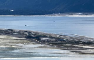 Cars leave Homer Spit in Homer, Alaska, on July 16, 2025. Photo: Tim Hatfield via AP