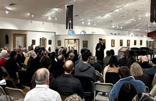 Archimandrite Sergius speaks to the crowd during the Nativity Retreat. Photo: Luke Albanese