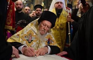 Patriarch Bartholomew signing the Tomos on January 5, 2019. Photo: BBC