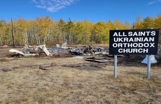 Ash and rubble is all that remains of the All Saints Ukrainian Orthodox Church parish in Bellis after an arson fire that burned down the church on Sunday, Sept. 21, 2025. Photo: