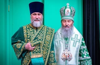 Protodeacon Vadym Novynskyi and Metropolitan Onuphry. Photo: Novinsky's Facebook