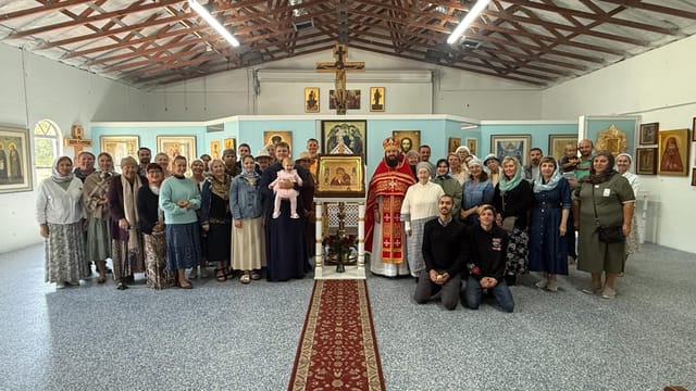 Our Lady of Pochaev parishioners after the first liturgy at their new church in North Port, Florida