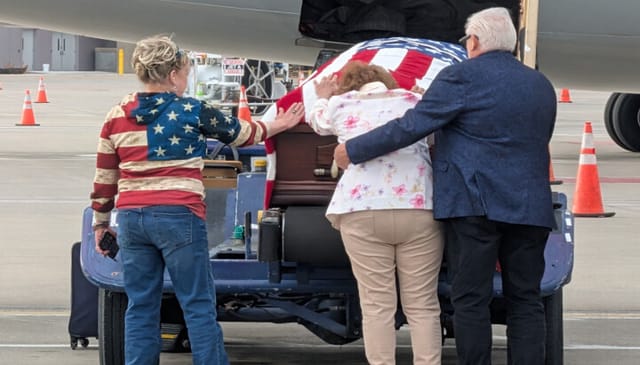 Family welcomes home Army PFC John A. Walko, who was killed in action during the Second World War. Photo: Kevin Gaydosh