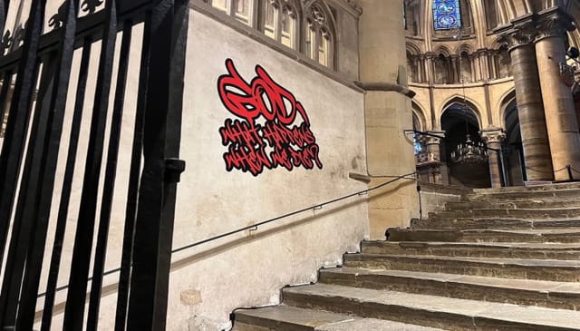 Graffiti-style sticker art in the Canterbury Cathedral. Photo: Canterbury Cathedral