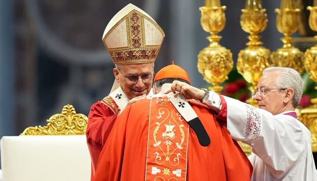 Cardinal McElroy receives the pallium from Pope Leo. Source: Catholic Standard