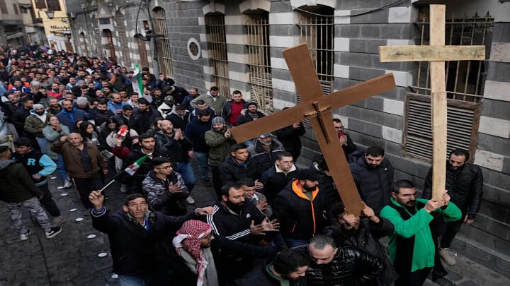 Christians protest in the street in Syria. Photo: Asia News