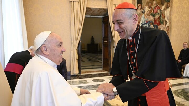 Pope Francis and Cardinal Fernandez. Source: America Magazine