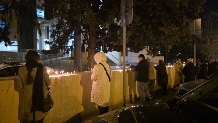 Mourners lit candles outside of Caucasus Medical Center in Tbilisi, where Patr. Ilia II fell asleep in the Lord. Photo: Sota News / X