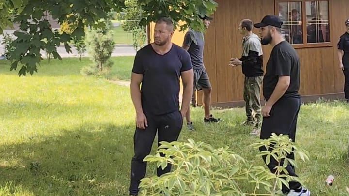 OCU militants on the cathedral grounds. Photo: UOJ's Ukrainian branch (SPZh)