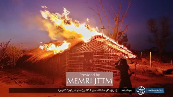 A home with a cross placed on top is burned down by Islamic terrorists in Mozambique. Photo: MEMRI