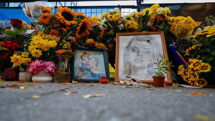 Flowers, drawings, and other items continue fill a memorial site dedicated to Iryna Zarutska. Photo: Associated Press/Nell Redmond