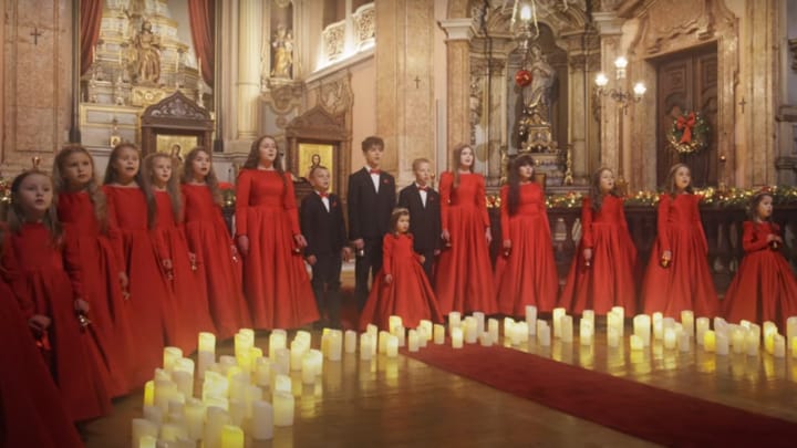 The Christmas carol is performed by children from the Ukrainian Orthodox parish in Lisbon. Photo: YouTube screenshot