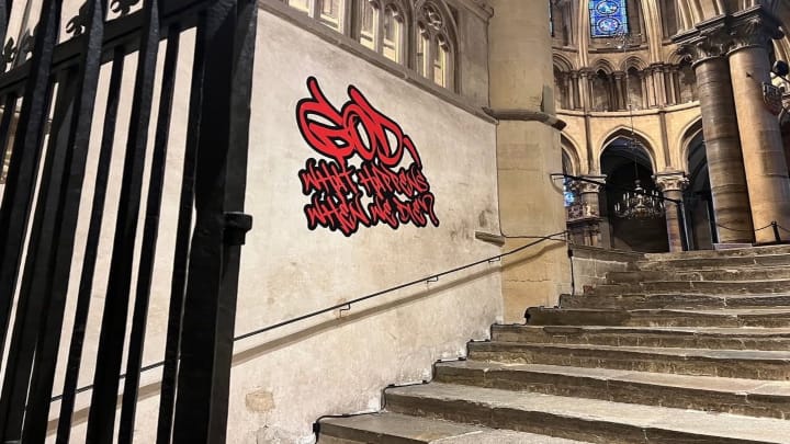 Graffiti-style sticker art in the Canterbury Cathedral. Photo: Canterbury Cathedral