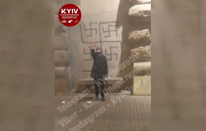 In Kyiv centre, teenagers openly Nazi salute on the background of swastikas