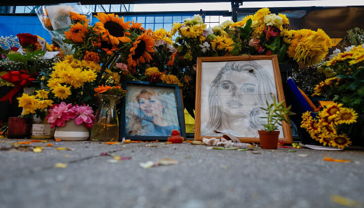 Flowers, drawings, and other items continue fill a memorial site dedicated to Iryna Zarutska. Photo: Associated Press/Nell Redmond