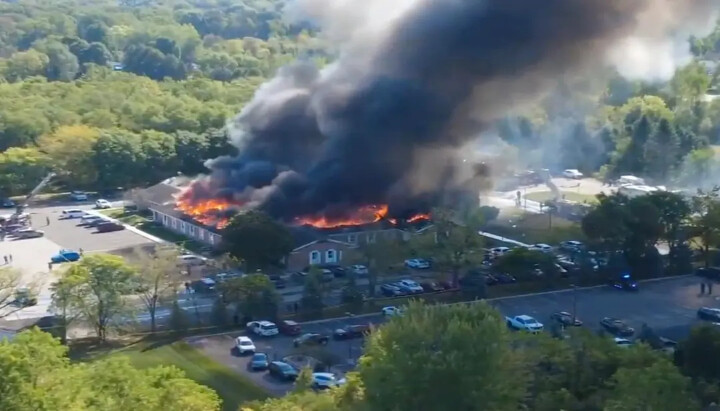 A Mormon church was set ablaze as a gunman entered and killed numerous attendees during a worship service, injuring several more. Photo: mcall.com